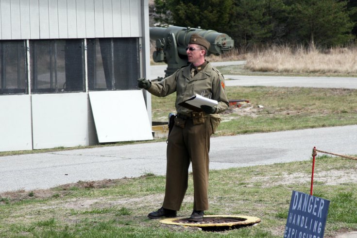 Explaining the gun firing demonstration